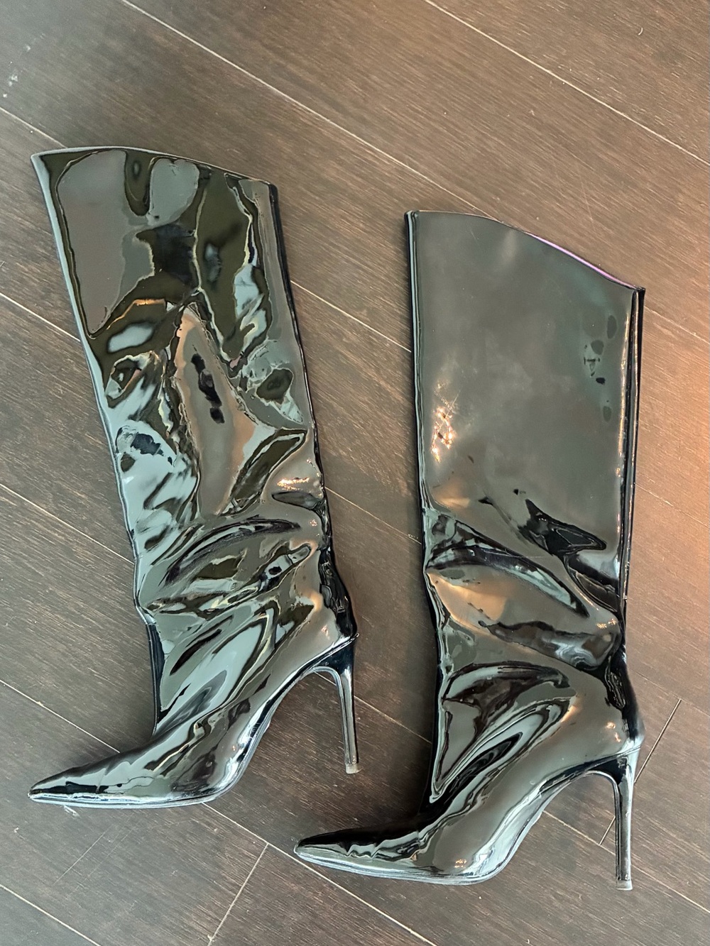 Black patent leather knee high boots